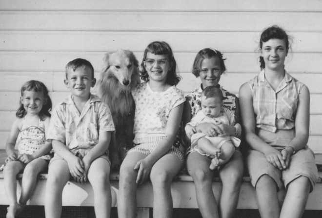 at age two with Nancy holding baby Steve along with the Schmitz cousins
